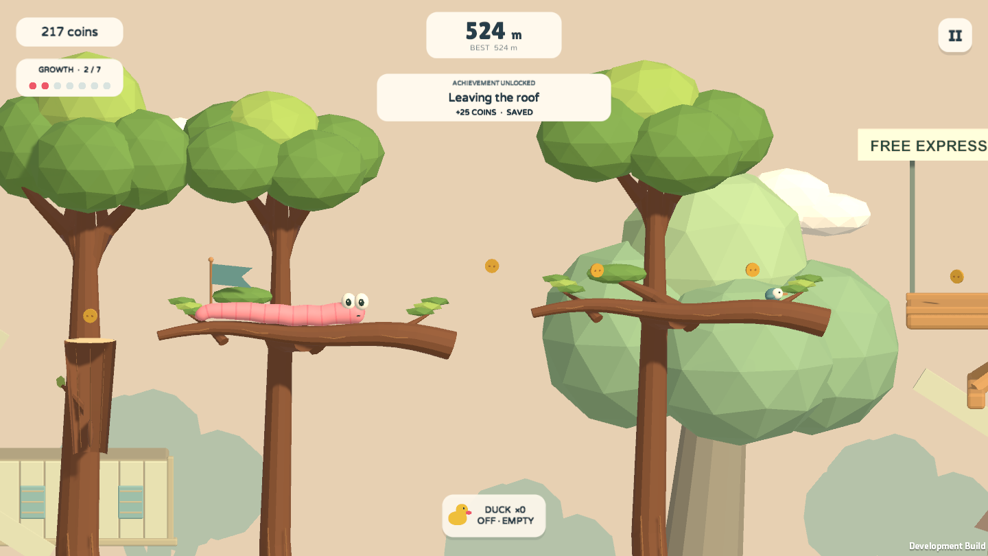 A pink worm balances on a tree branch between leaves and coins
